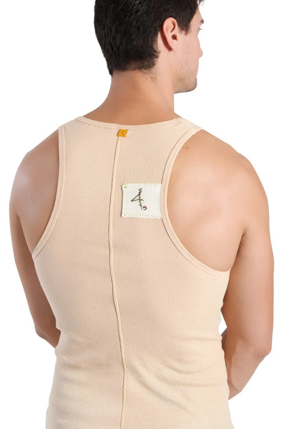 Back view of edge sustain tank top in sand beige ribbed cotton with central zipper and white label with black calligraphy