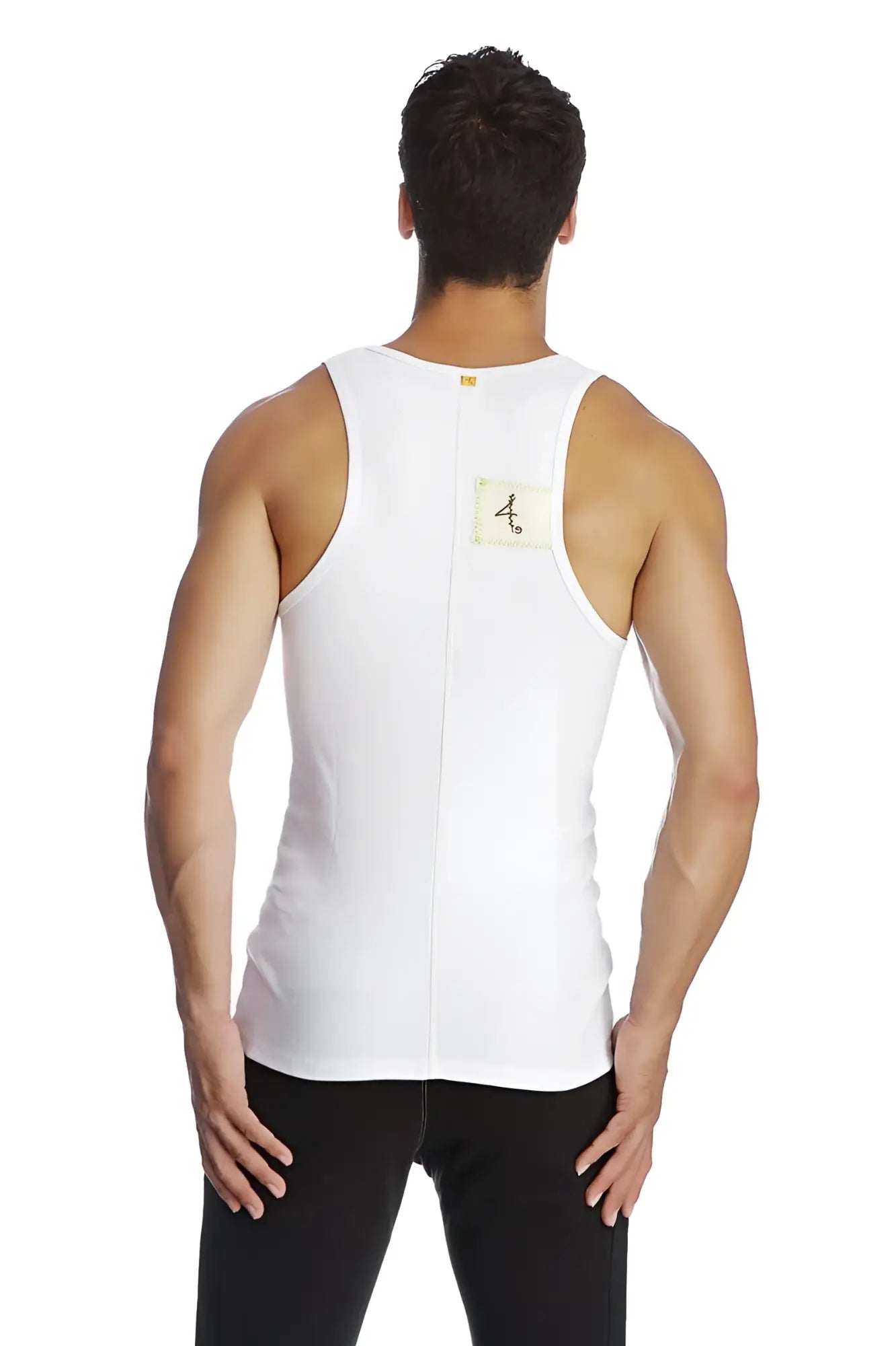 Back view of white edge sustain tank top with sleeveless design and central zipper on athletic fabric