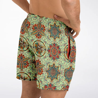 Men's swim shorts by Maris Equi featuring a colorful mosaic pattern elastic waistband and side pockets.
