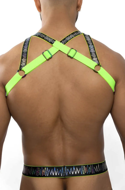 Electro holographic harness featuring neon green harness with black patterned straps and metallic buckles
