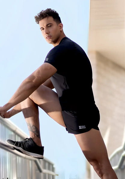 Black ergowear built in feel bikini mesh gym shorts with gray side panel and gym branding size l