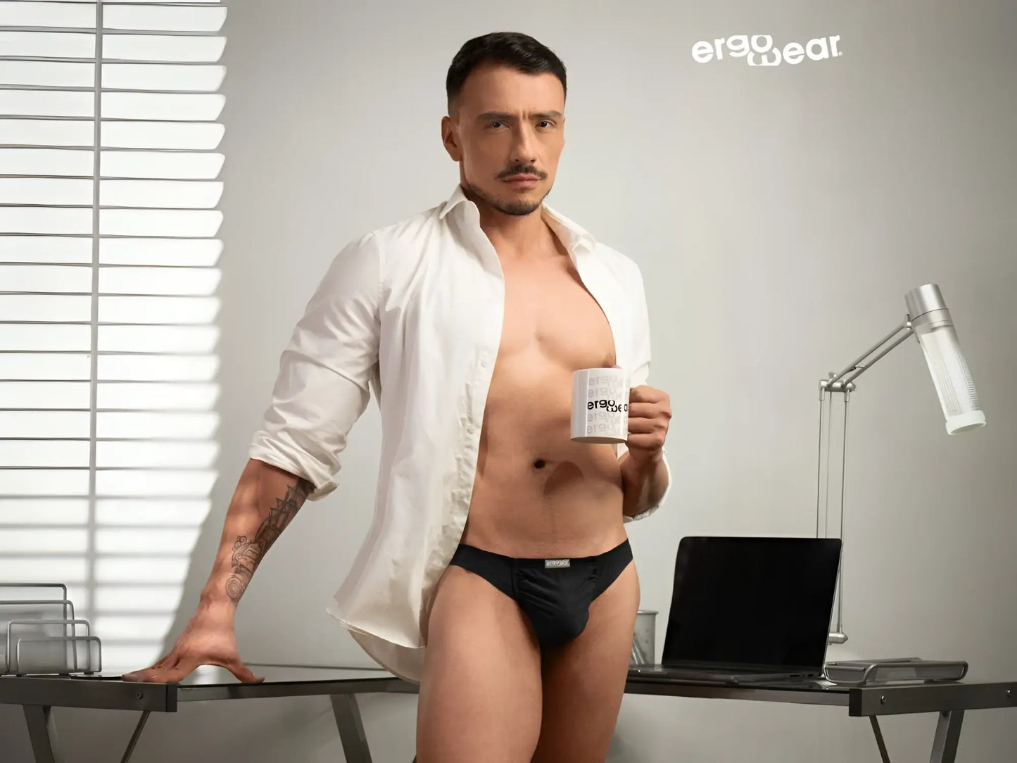 Black ergonomic cotton briefs with subtle brand logo on waistband from ergowear ew1727 feel gr8 bikini collection