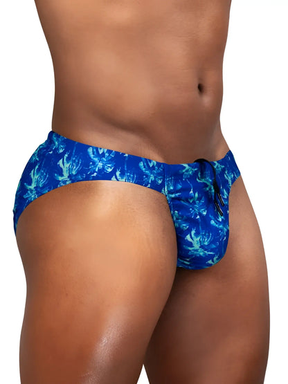 Blue swim trunks by ergowear featuring a vibrant tropical leaf pattern and black drawstring in royal blue