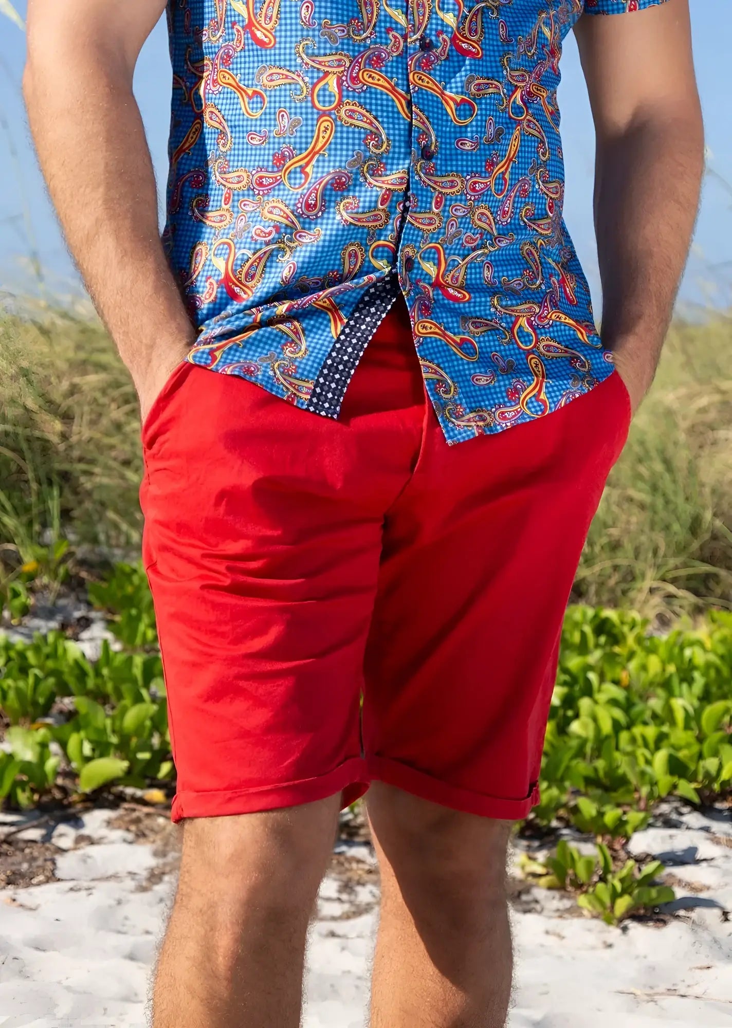 Bright red essential cotton short made of smooth fabric with neatly cuffed hem available in 4 colors