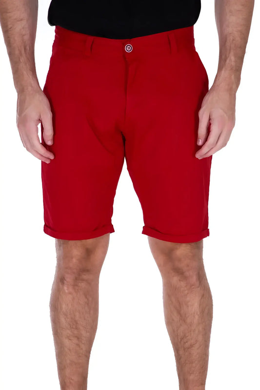 Red essential cotton shorts with button closure and rolled cuffs made from breathable cotton fabric