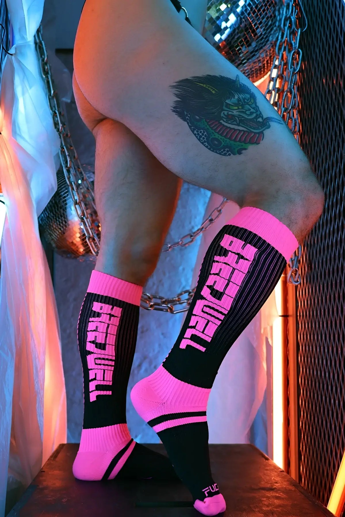 Eternity socks black and neon pink athletic socks with bold vertical lettering ribbed texture and bright pink cuff