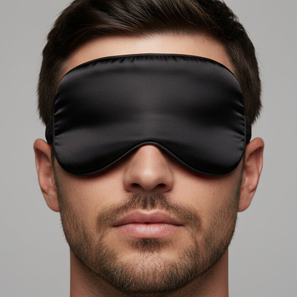 Black satin silk eye mask with smooth glossy finish and elasticized edges by MetroMaleWear for comfortable sleep
