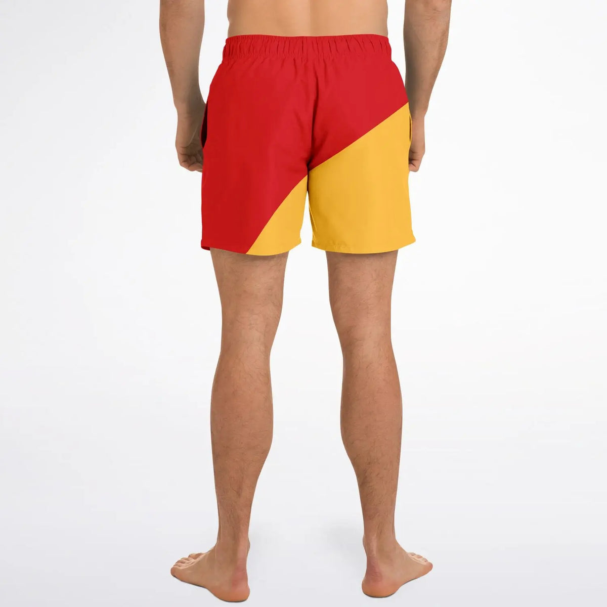 Men's swim shorts by Maris Equi in red and yellow featuring a color-block design and elastic waistband shown from the back.
