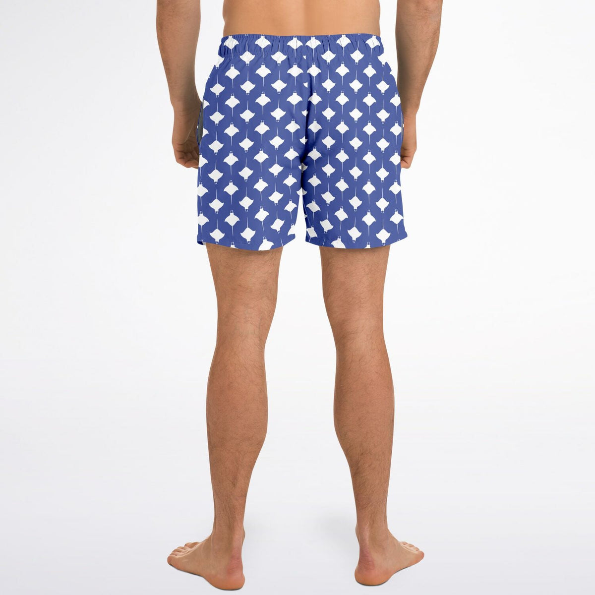 Men's swim shorts in blue with white manta ray pattern featuring an elastic waistband by Maris Equi.