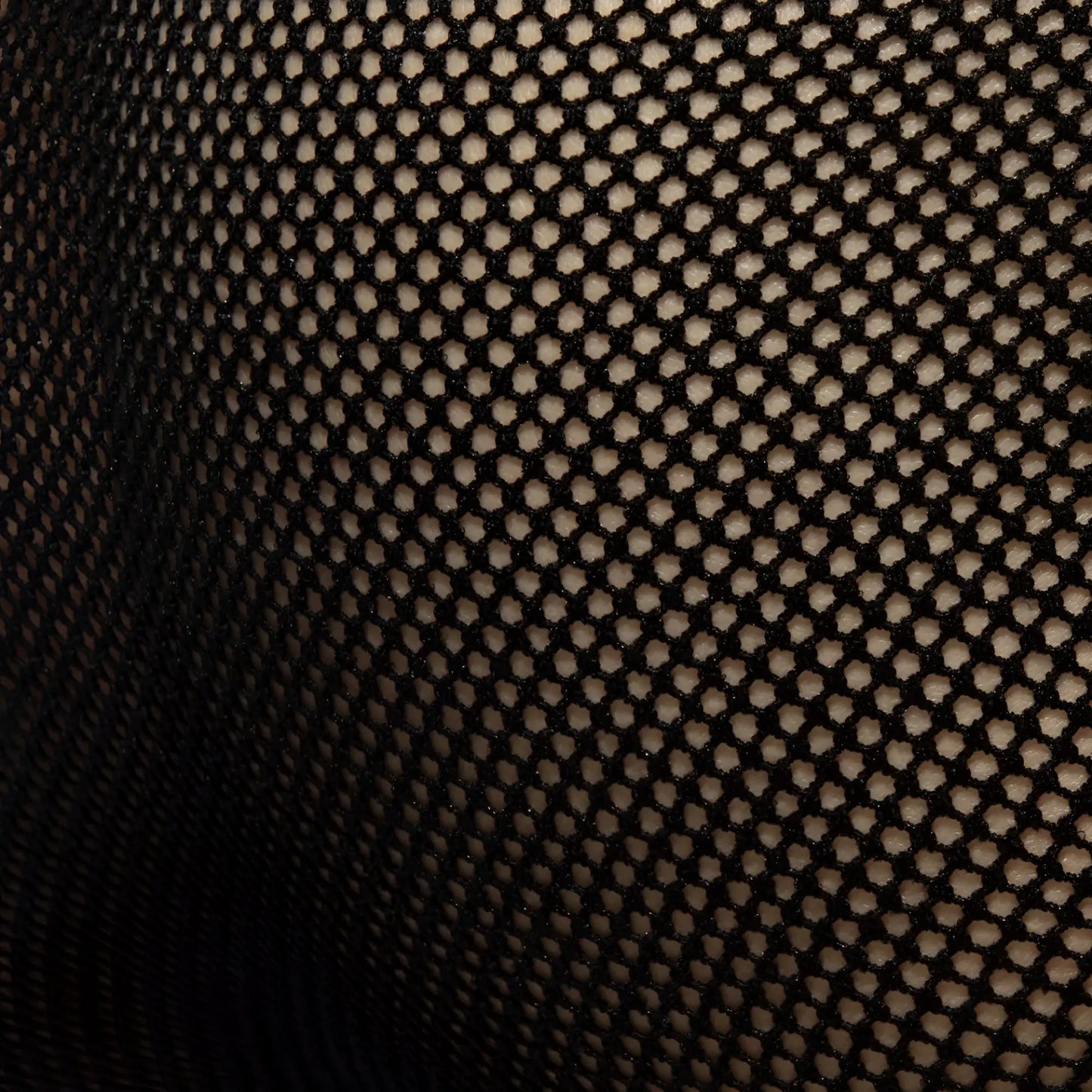 Black fever mesh brief fabric featuring a consistent hexagonal mesh pattern for breathability and comfort