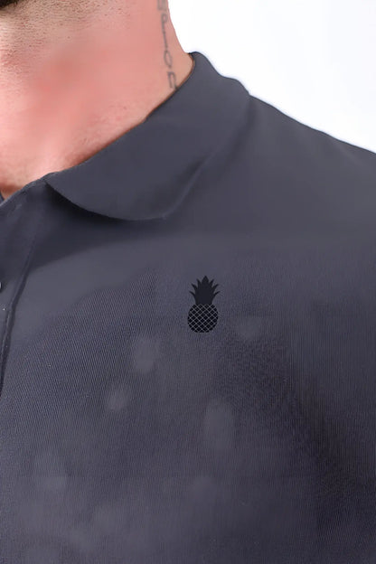 Fitted polo crop top in dark grey with a subtle black embroidered pineapple logo on the left chest