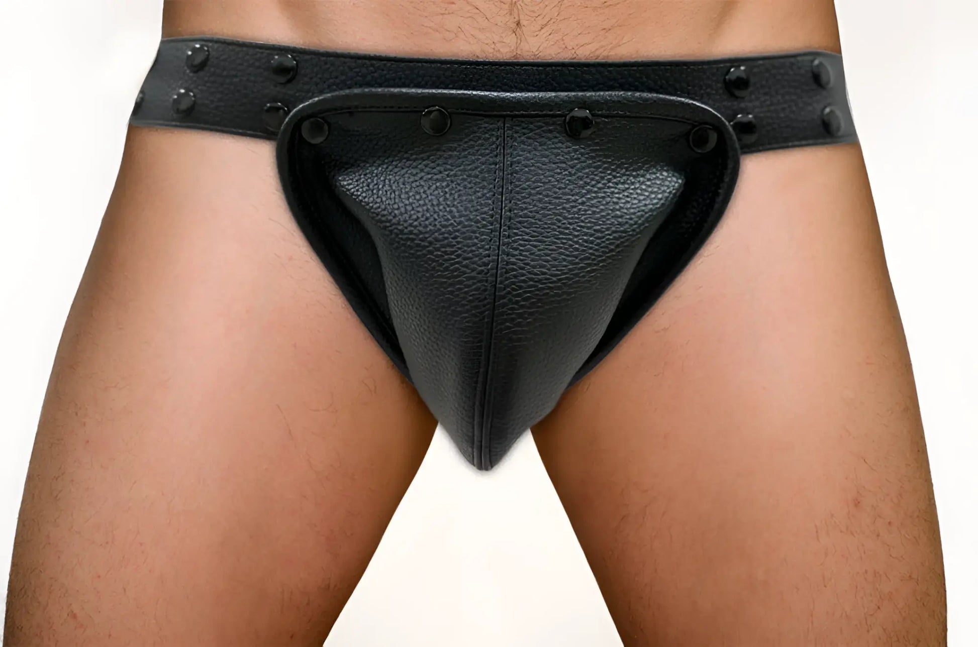 Black leather thong jockstrap with removable pouch textured surface and decorative rivets along waistband
