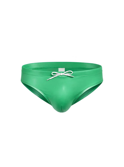 Vibrant green glossy faux leather swim trunks with white drawstring bow in fizx swim bikini with removable push pad