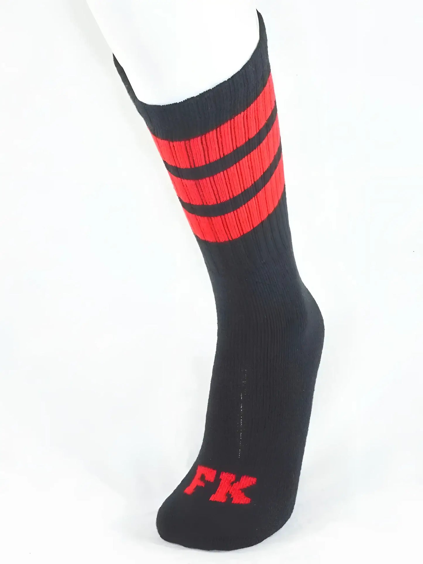 Black athletic tube sock with bold red stripes and matching fk logo on the toe for sport use