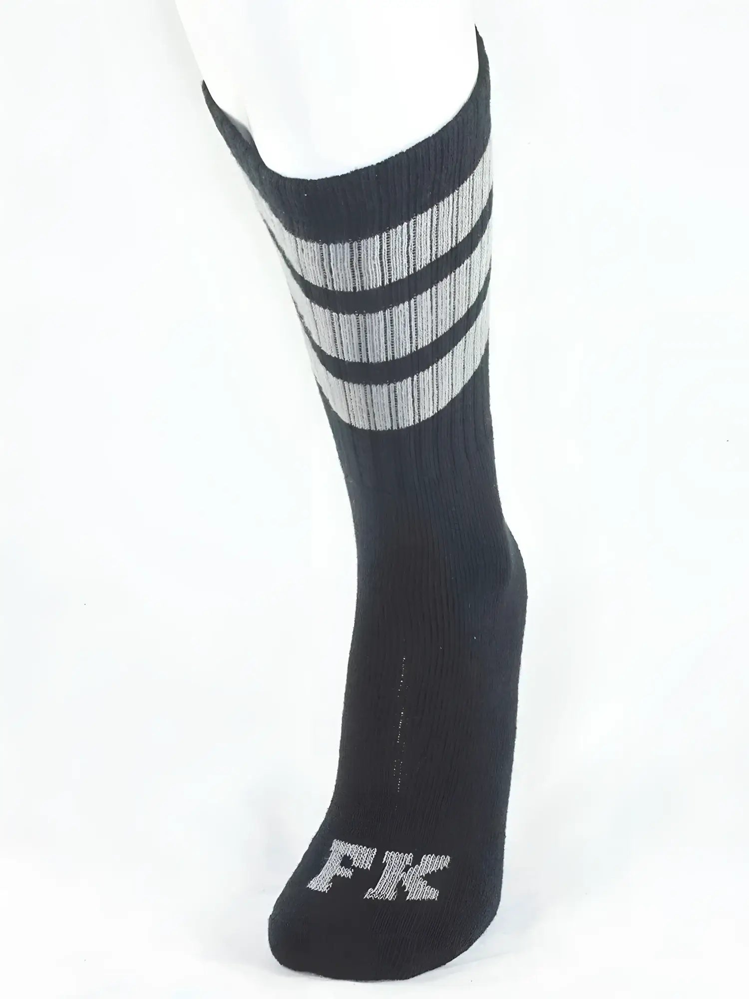Fk sport black tube sock with three gray stripes and silver fk logo embroidered on the toe for athletic use