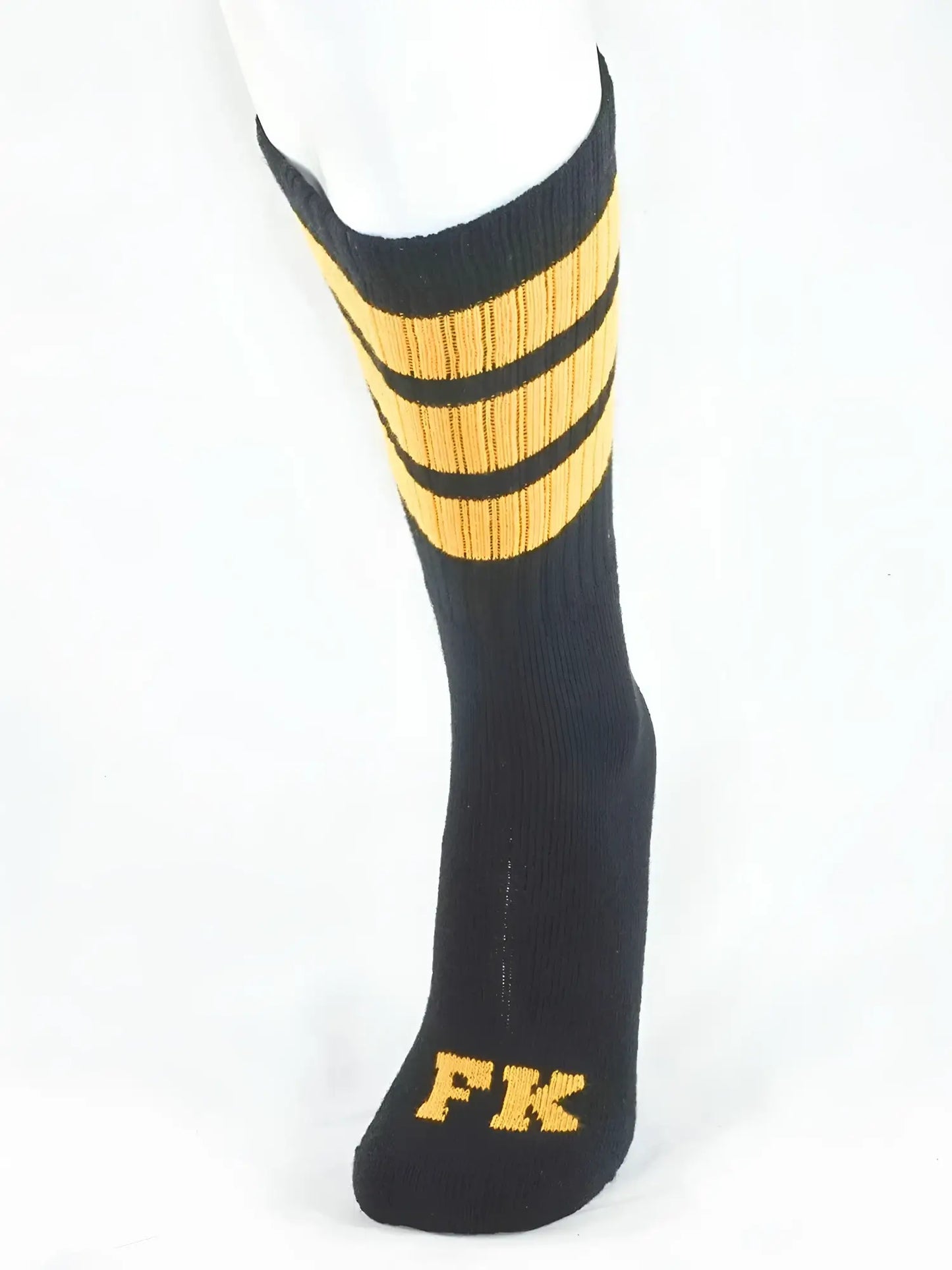 Fk sport black tube sock with three gold stripes and fk logo embroidered on the toe in gold thread