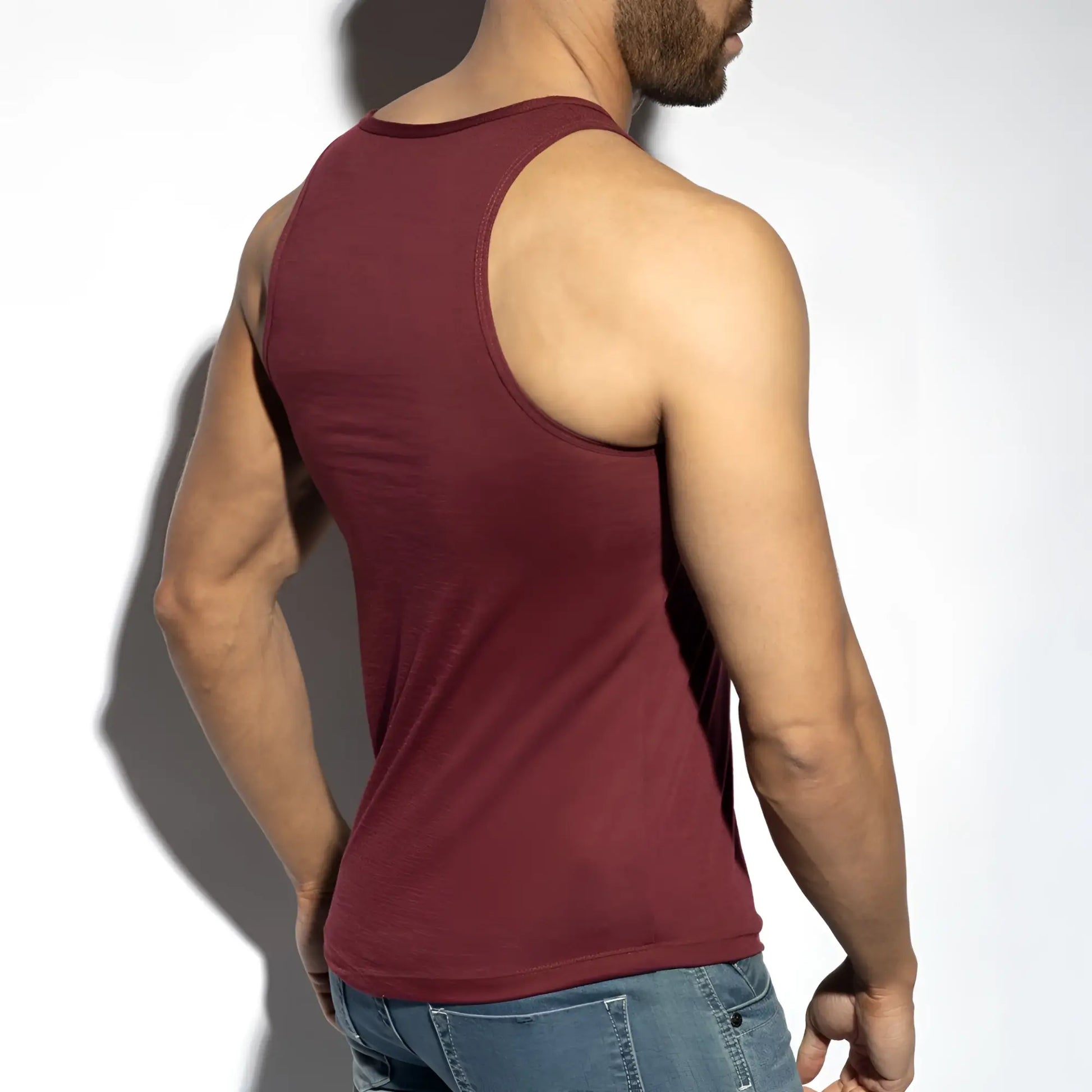 A maroon flame tank top sleeveless with a simple round neckline and ribbed hem for casual wear