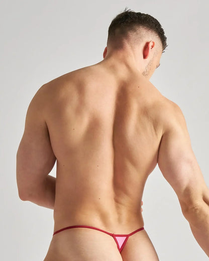 Pink triangular micro thong with red trim featuring sheer mesh fabric for a bold and flirty look