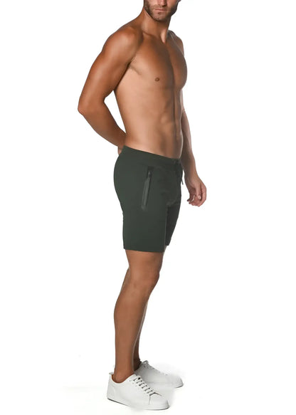 Dark green fleece flex-cotton stretch shorts with sleek modern design and zippered side pocket for athletic use