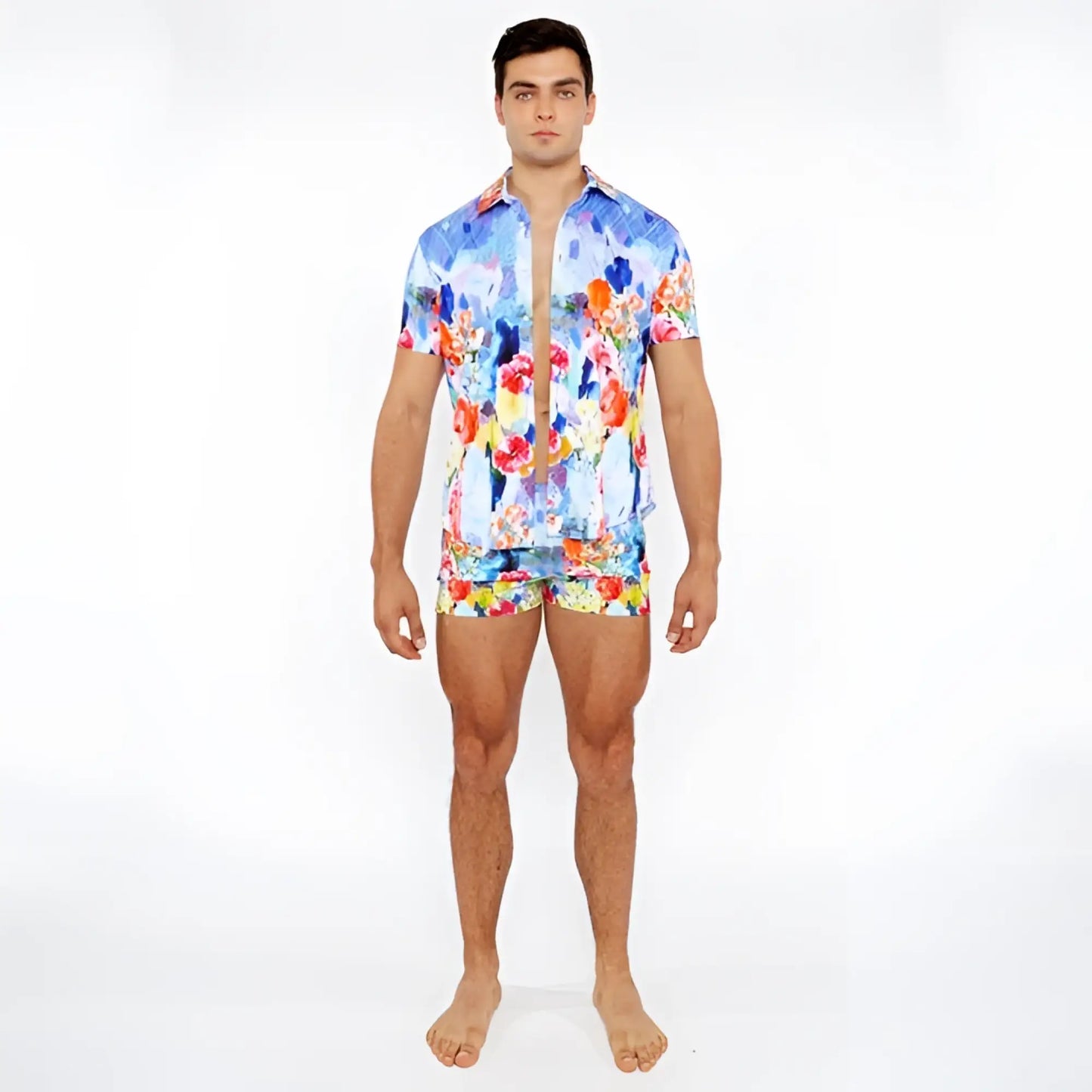 Vibrant blue red and yellow floral abstract printed swim short set with short-sleeved button-up shirt and matching shorts