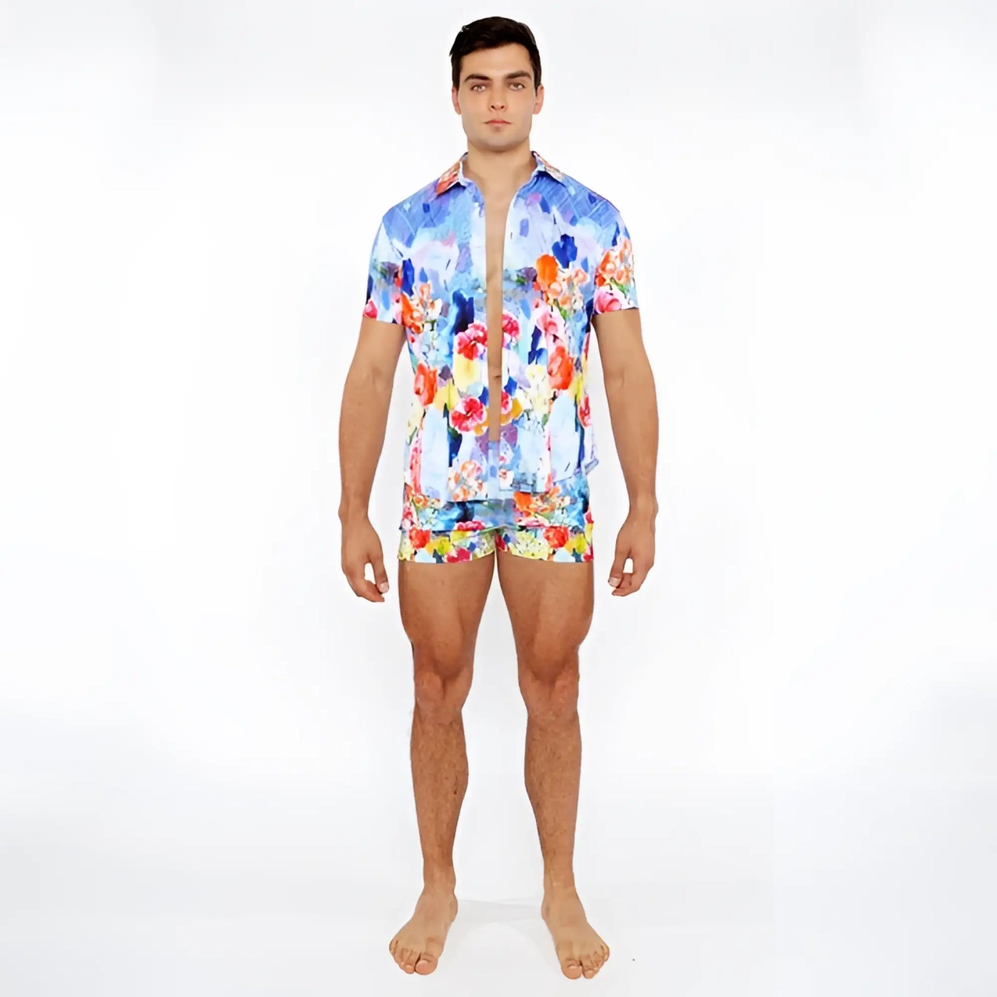 Vibrant blue red and yellow floral abstract printed swim short set with short-sleeved button-up shirt and matching shorts