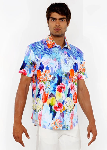 Vibrant floral abstract short-sleeved woven modal border shirt in blue pink orange and yellow on a light background