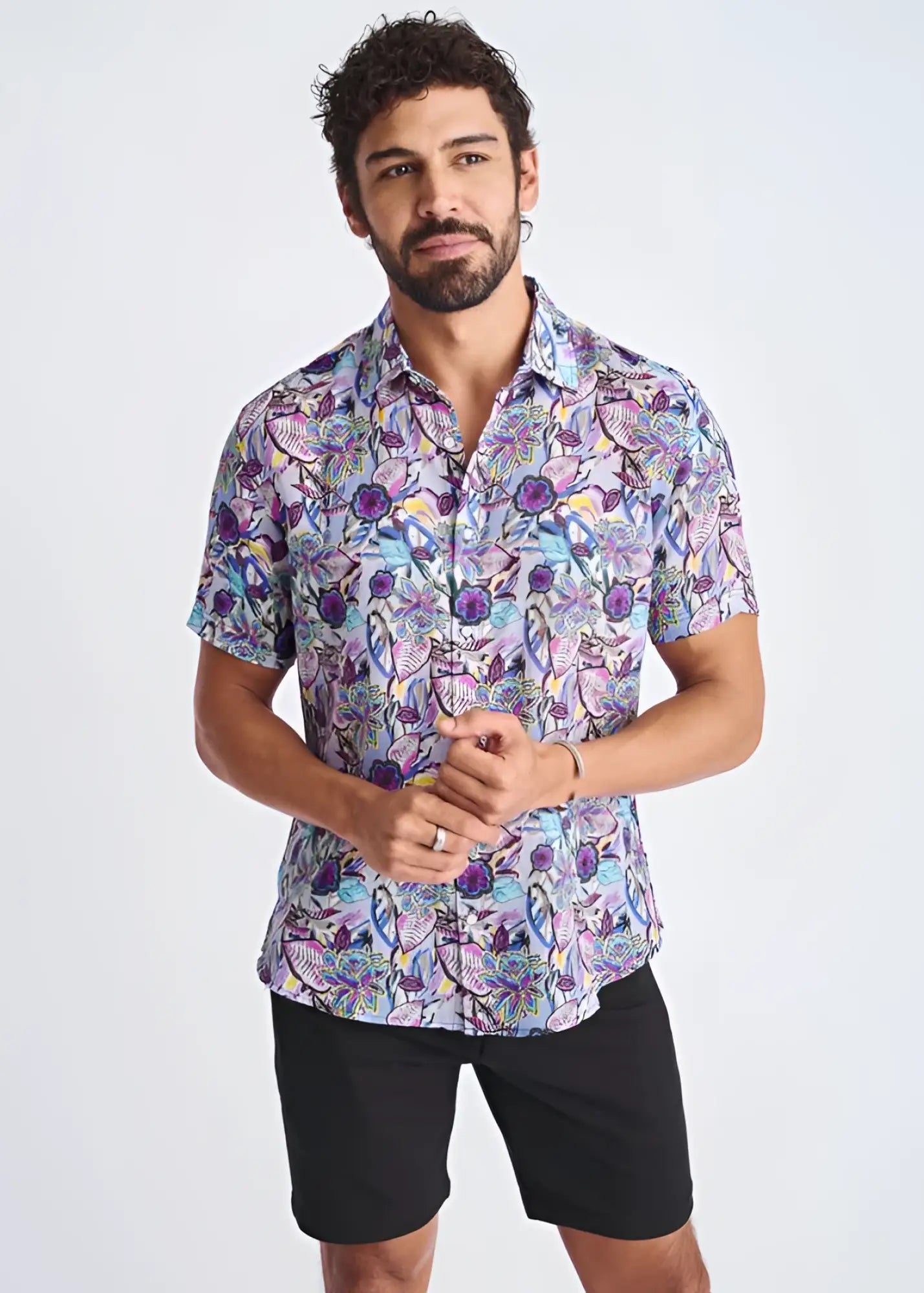 A vibrant purple and blue floral lightweight linen tencel short-sleeved button-up shirt for summer wear