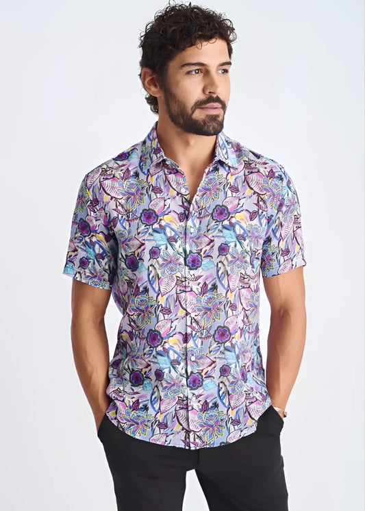 A floral lightweight linen tencel short-sleeved button-up shirt with purple blue and pink pattern on lavender background