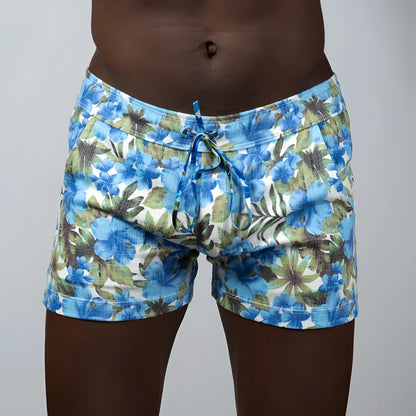 Blue and green floral print linen texture swim shorts with a drawstring waistband for casual beachwear