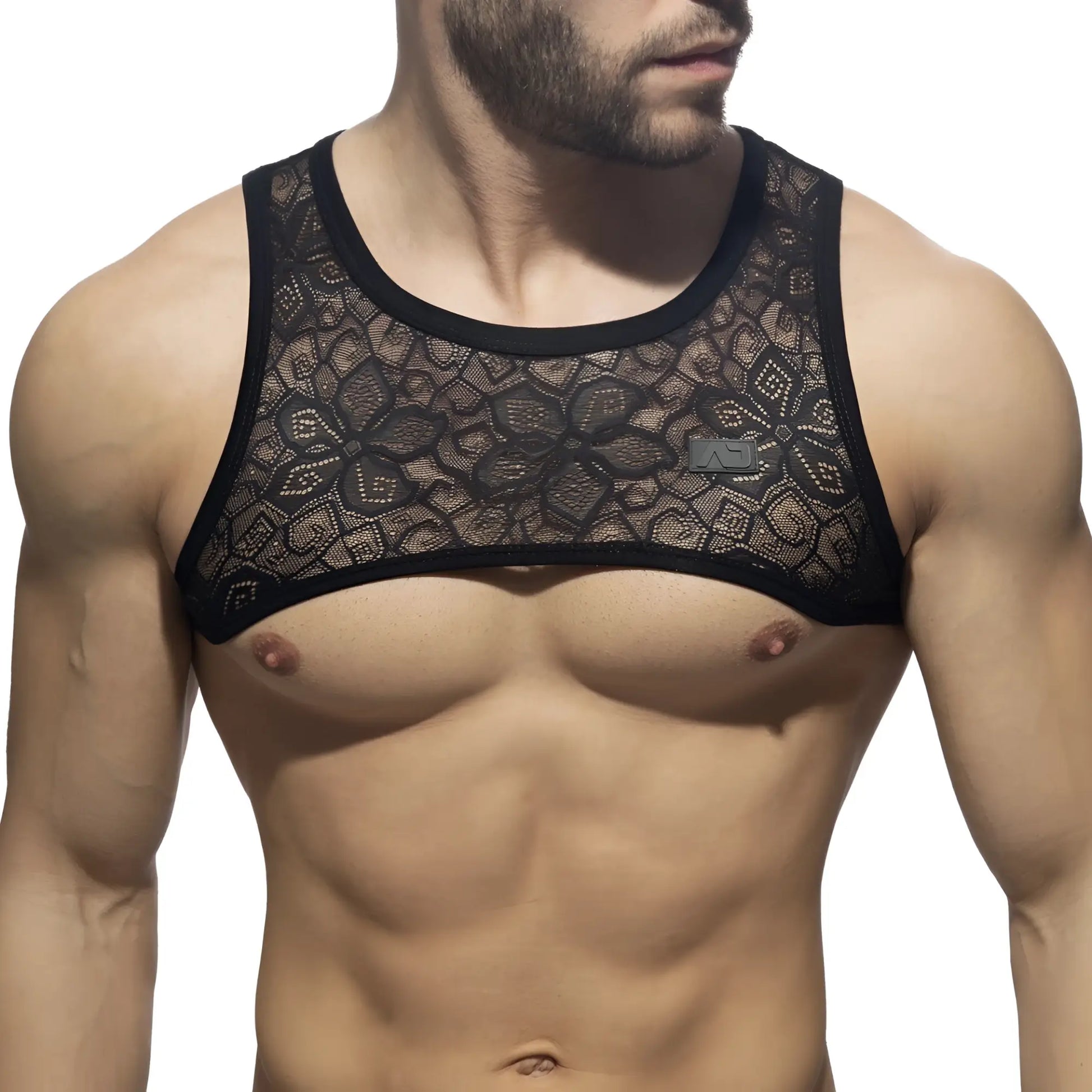 Black lace tank top with floral pattern and solid black trim in flowery lace harness design