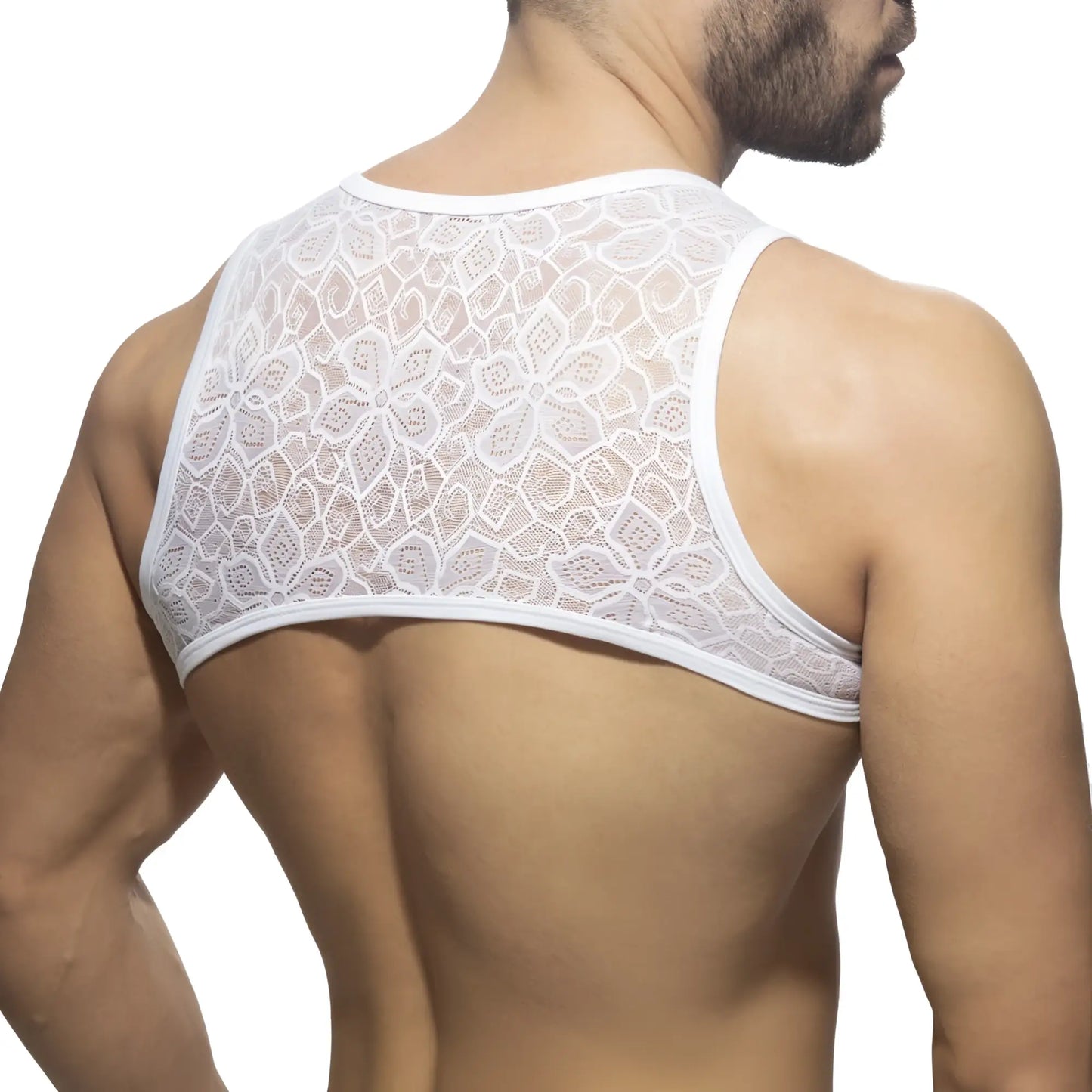 White floral lace harness tank top featuring delicate lace material and floral design for stylish layering