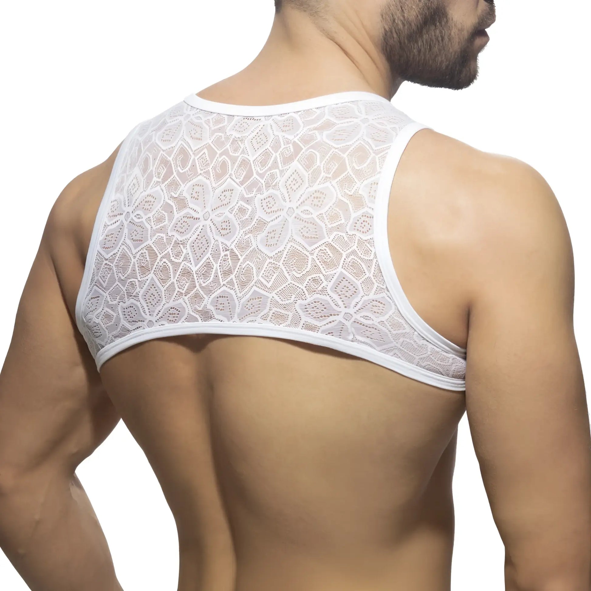 White floral lace harness tank top featuring delicate lace material and floral design for stylish layering