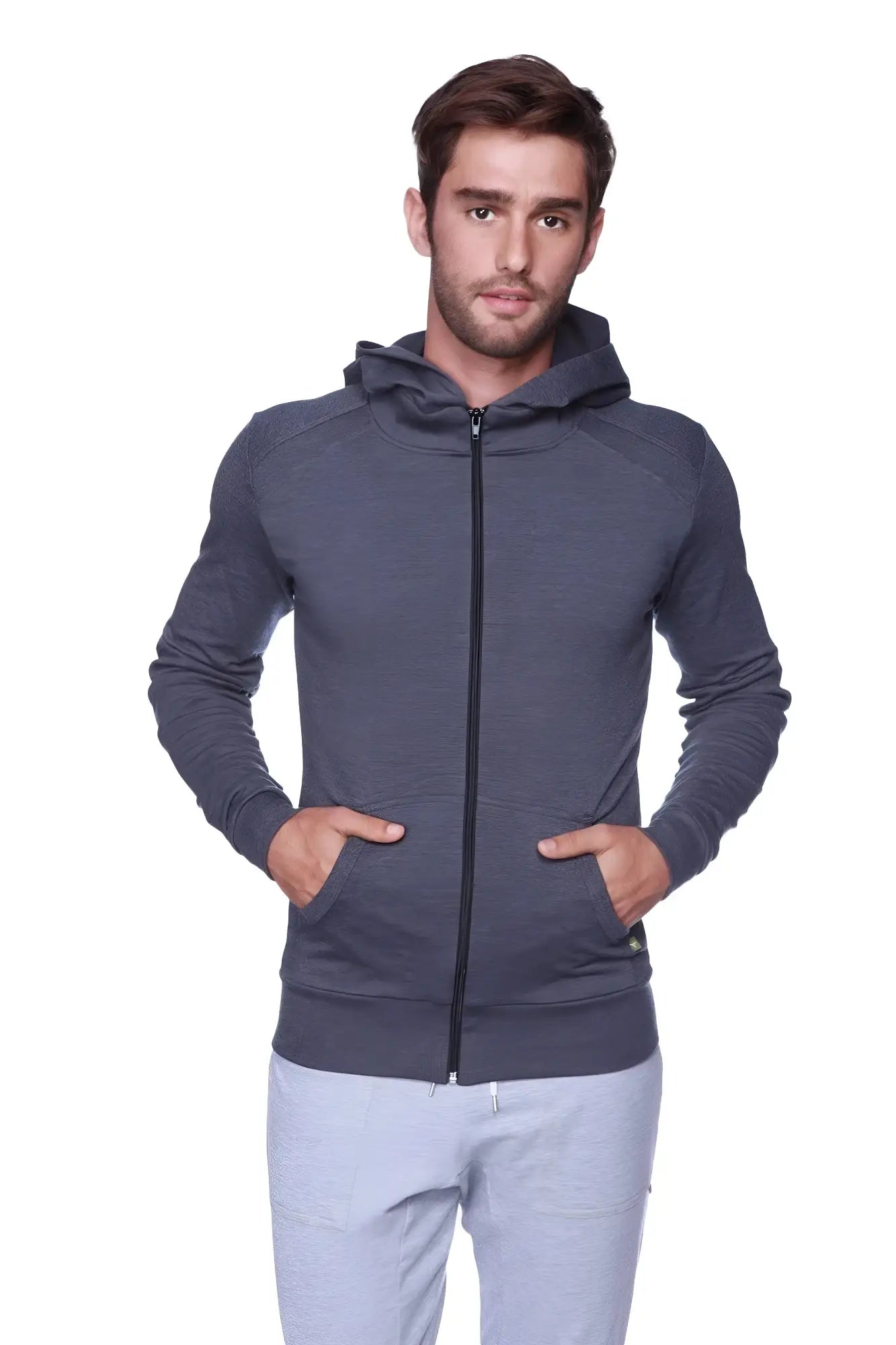 Form-fit crossover yoga track performance hoodie in charcoal with textured fabric and black zipper for active wear