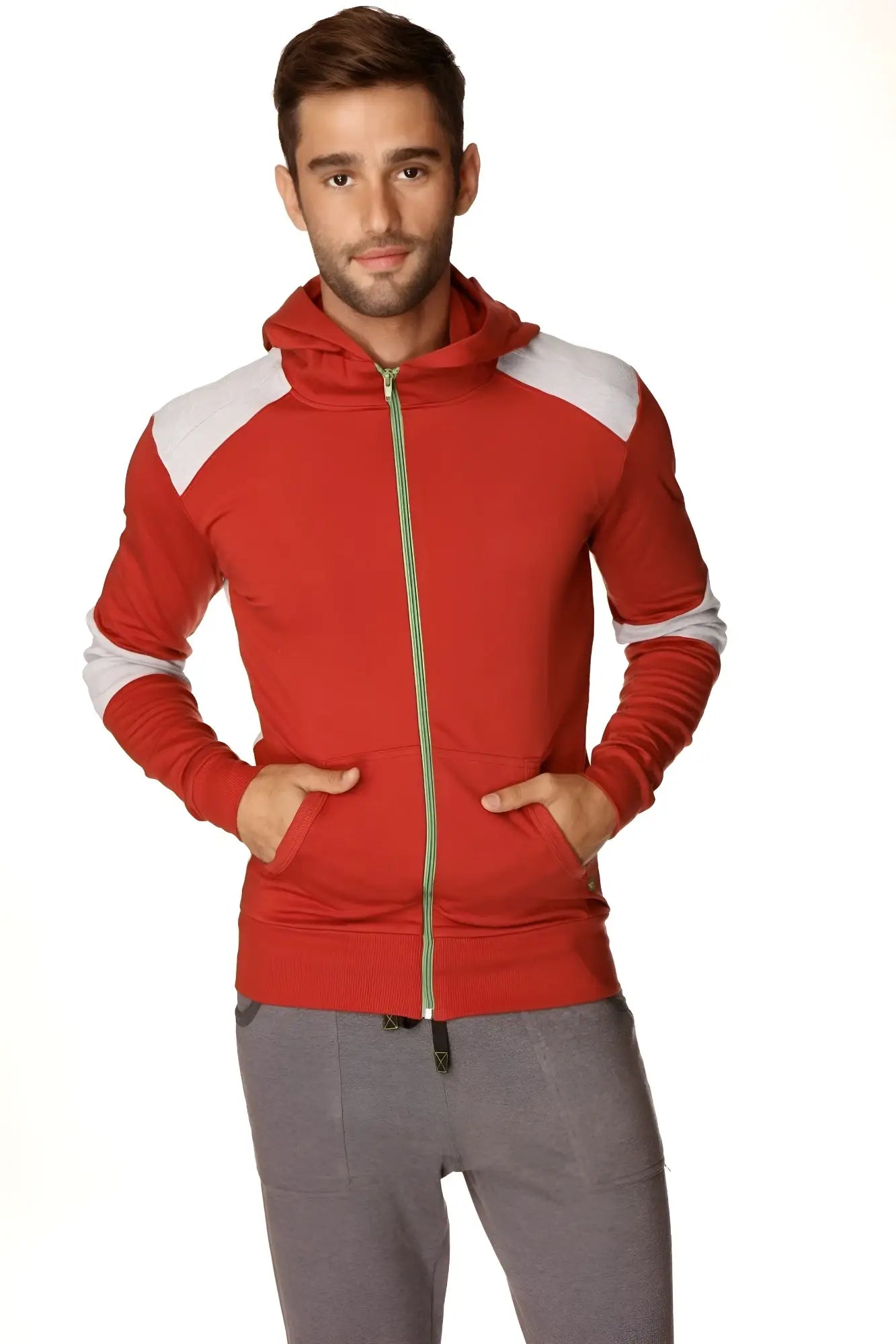 Form-fit crossover yoga track performance hoodie in red and white color block with gold zipper in cinnabar grey fabric
