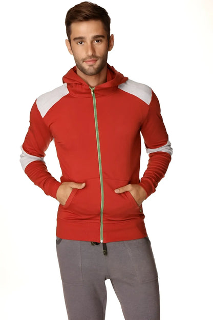 Form-fit crossover yoga track performance hoodie in red and white color block with gold zipper in cinnabar grey fabric