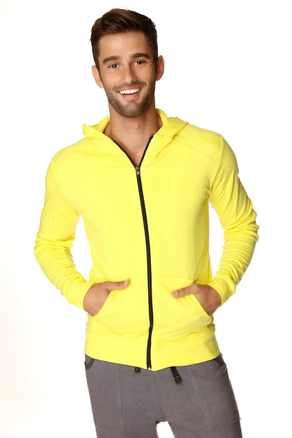Form-fit crossover yoga track performance hoodie in tropic yellow with black zipper and front pockets for activewear