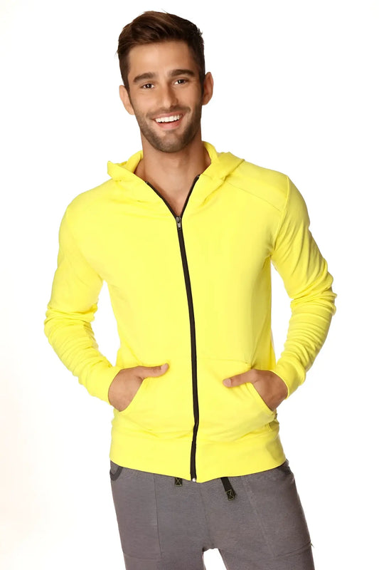 Form-fit crossover yoga track performance hoodie in tropic yellow with black zipper and front pockets for activewear