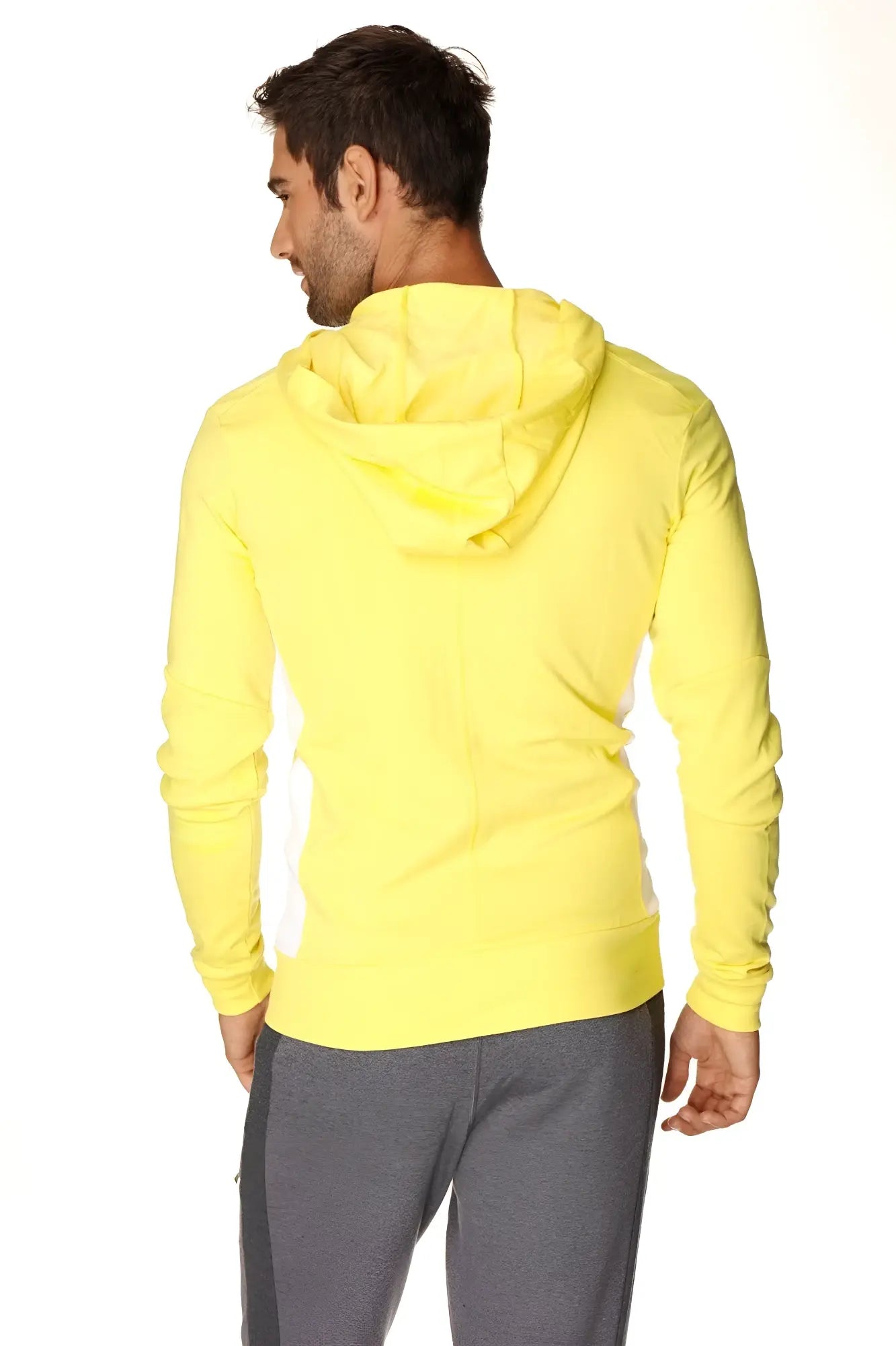 Form-fit crossover yoga track performance hoodie in tropic yellow with white features a bright yellow hooded design with long sleeves and ribbed hem
