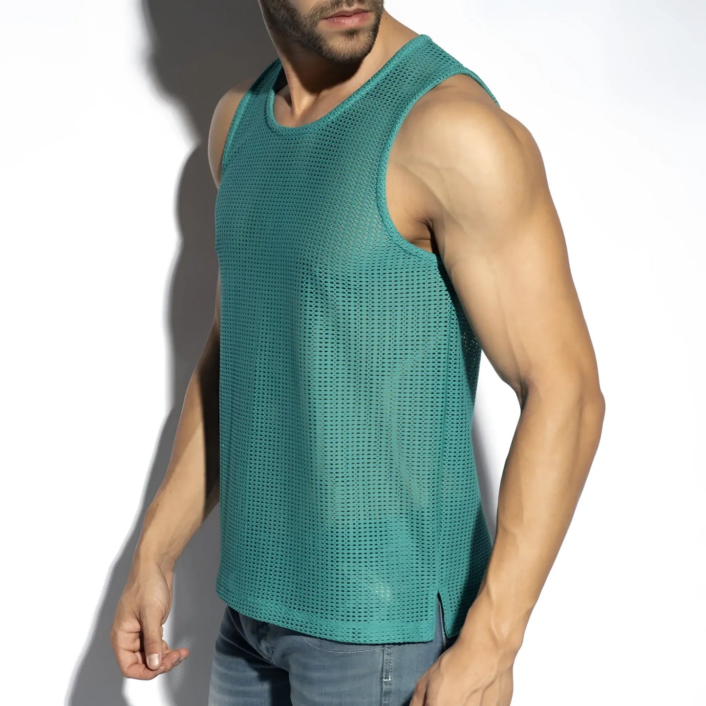 Teal mesh sleeveless formentera retro tank top featuring breathable fabric and a retro-inspired design