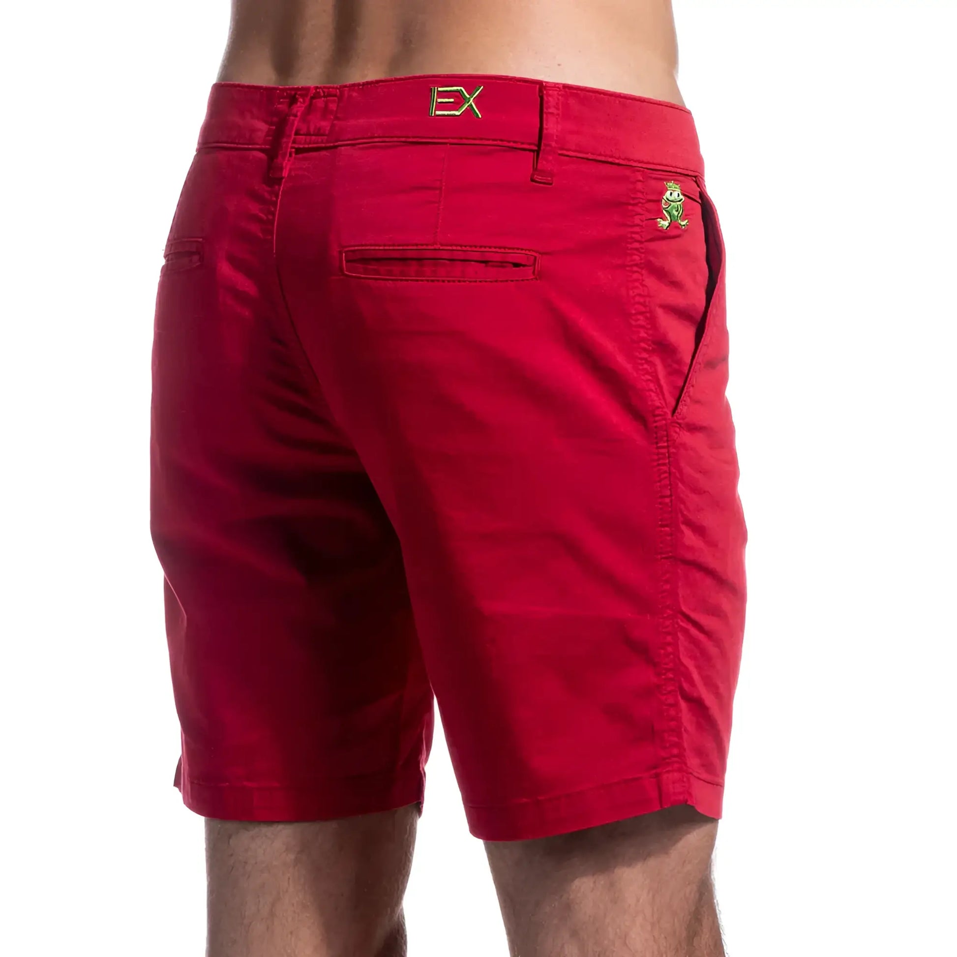Red chino short showing back side with gold ex logo on waistband and green frog emblem on back pocket