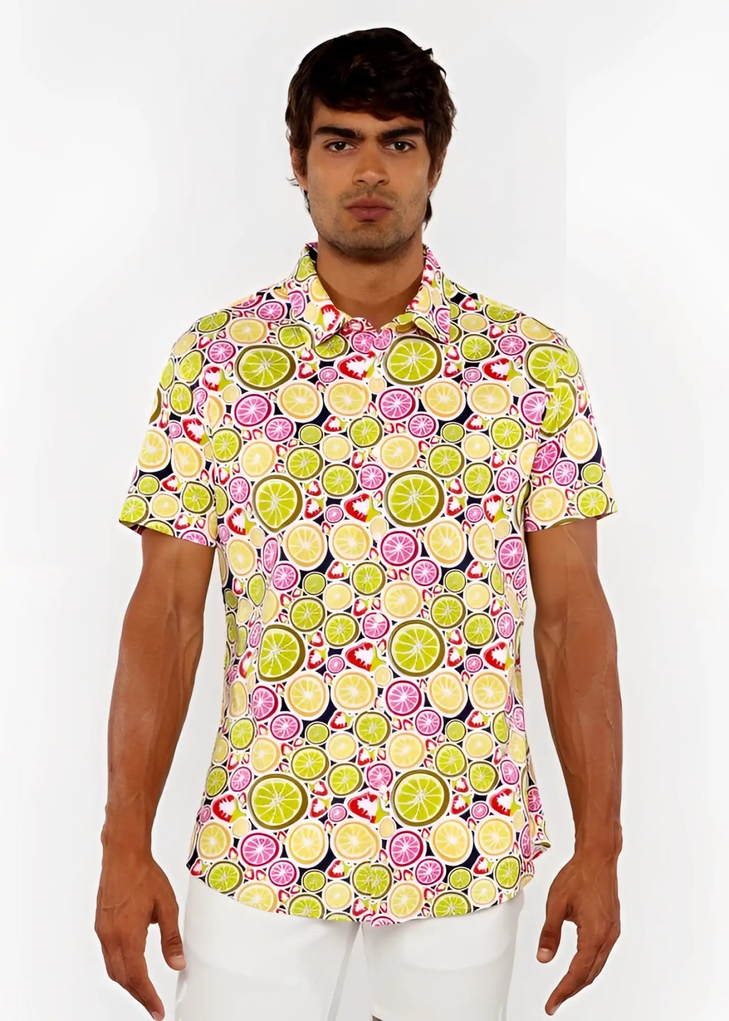 A vibrant fruits print stretch knit short-sleeved polo shirt with lime and pink citrus slices on light yellow background