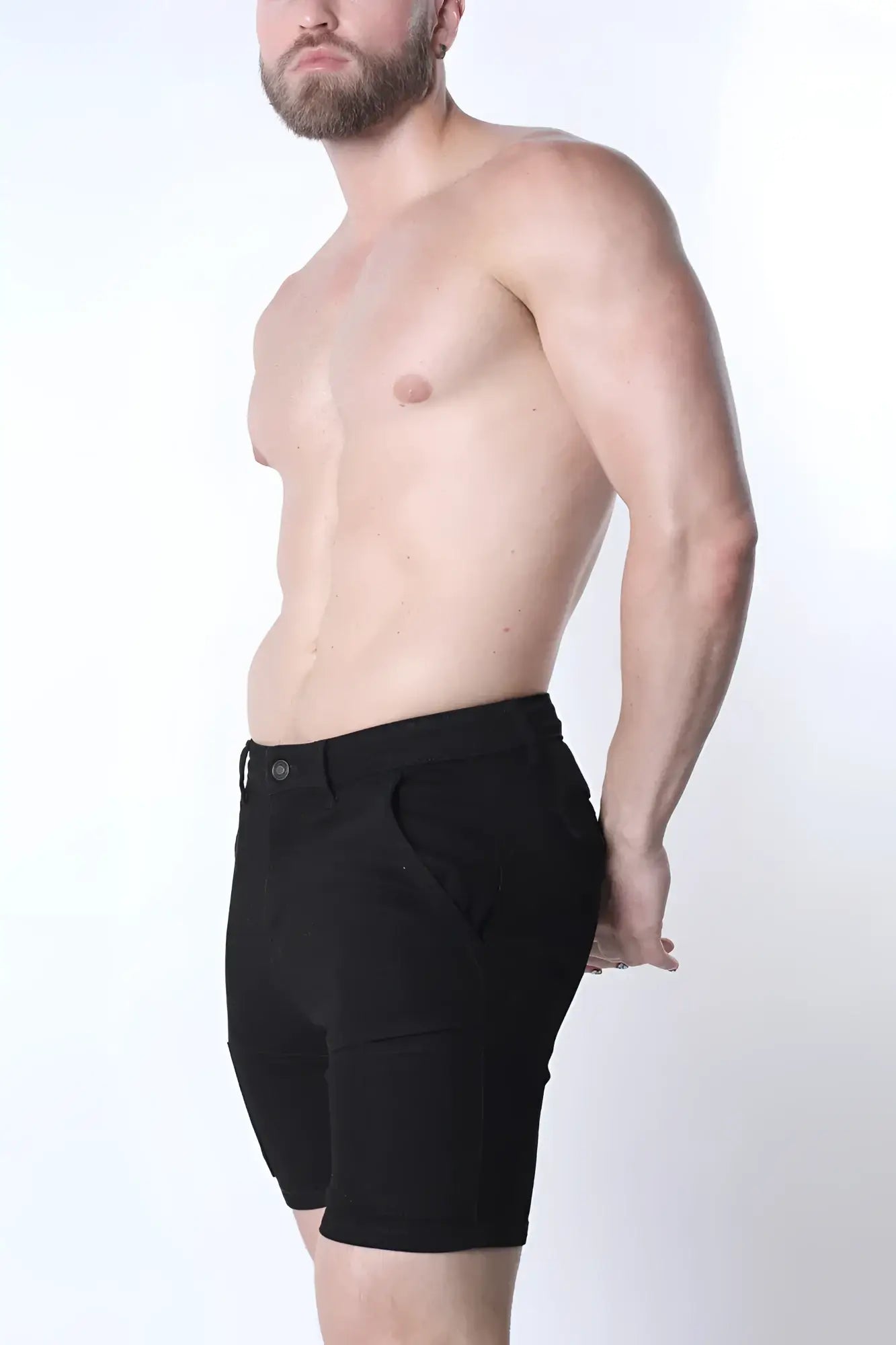 Black full court denim zipper shorts with sleek tailored fit and subtle stitching details visible from the back side