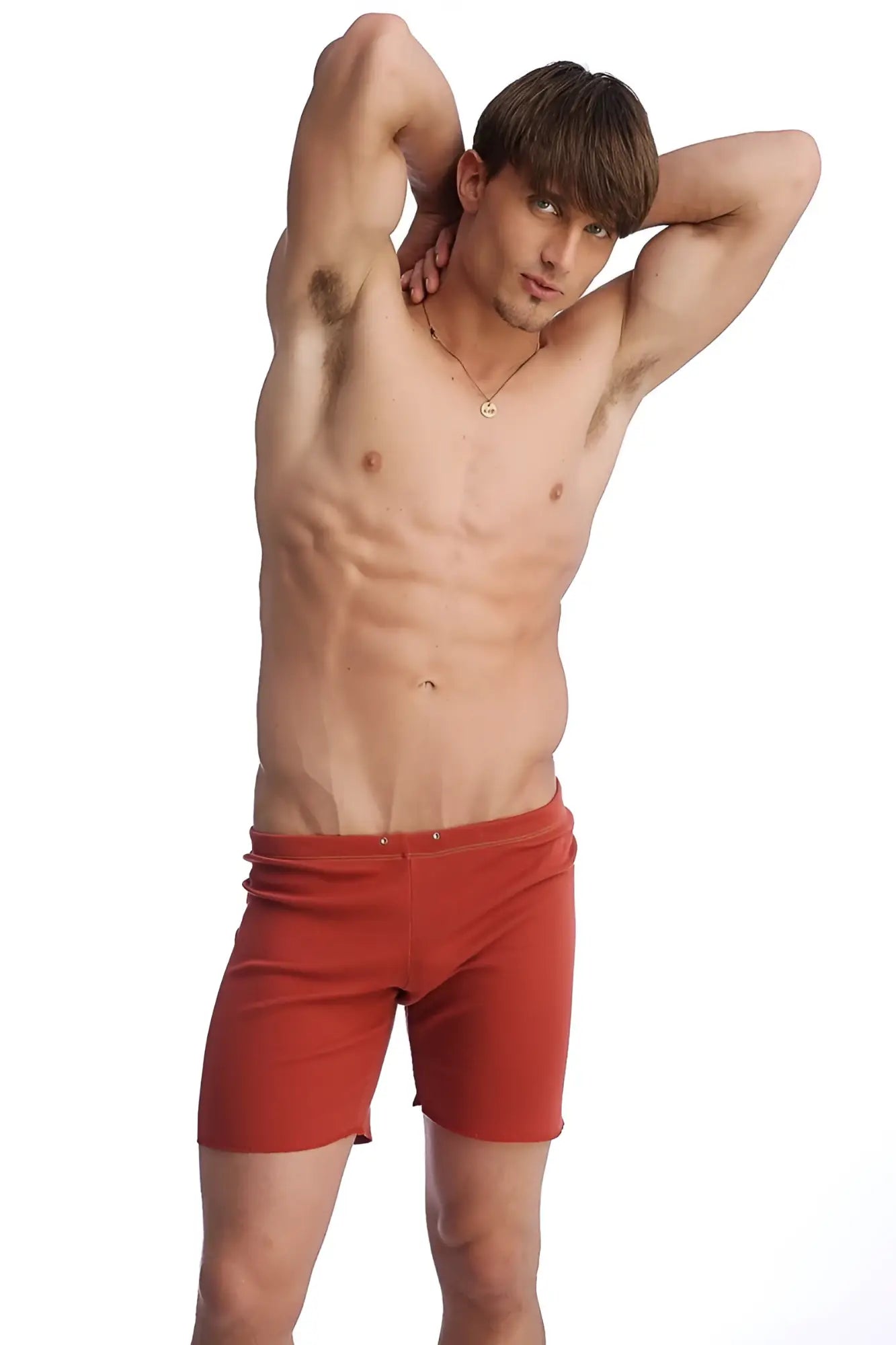 Fusion yoga short in cinnabar red featuring a snug fit elastic waistband designed for athletic use