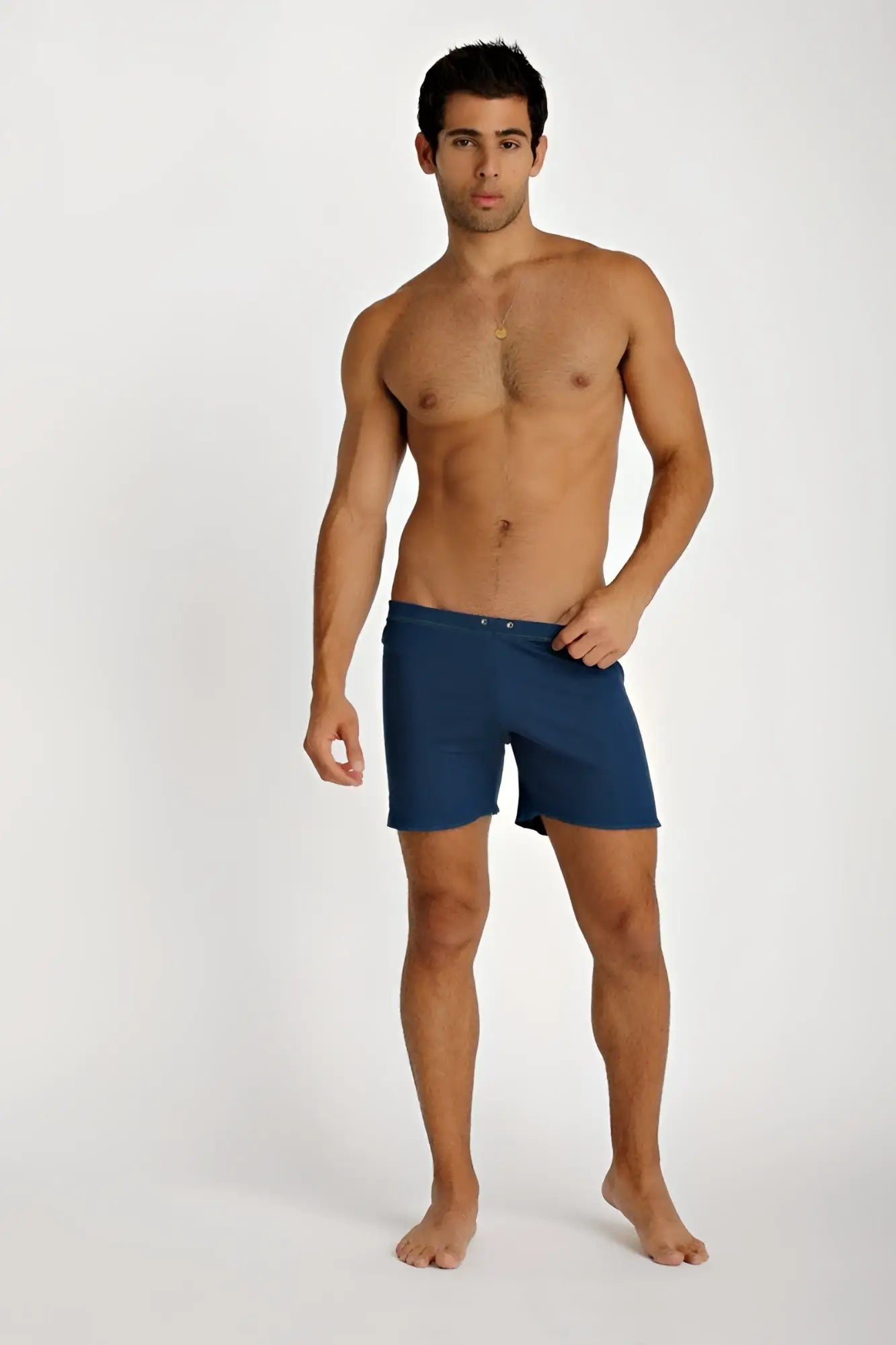 Navy blue fusion yoga shorts with a simple design and button closure at the waist for comfortable swimwear