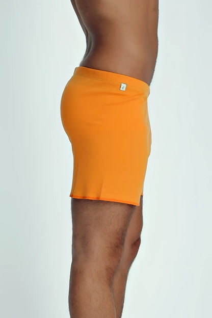 Fusion yoga short sun orange bright orange ribbed men’s shorts with a small white logo on the waistband