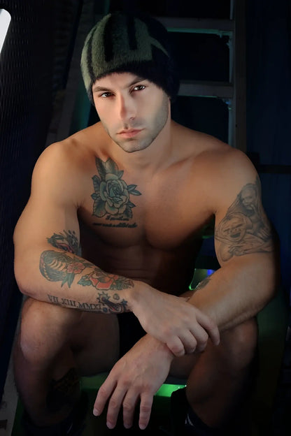 Dark green fuzz daddy beanie knit with a textured ribbed brim for warmth and style