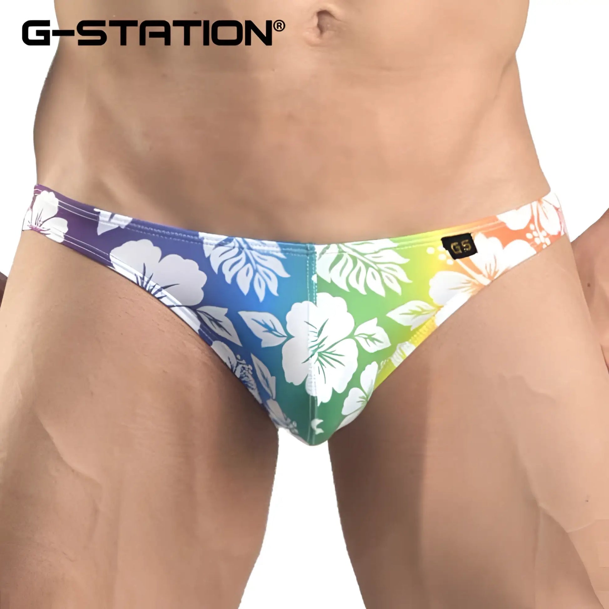 G-station hibiscus bikini underwear size M with vibrant tropical floral pattern on gradient purple to yellow background