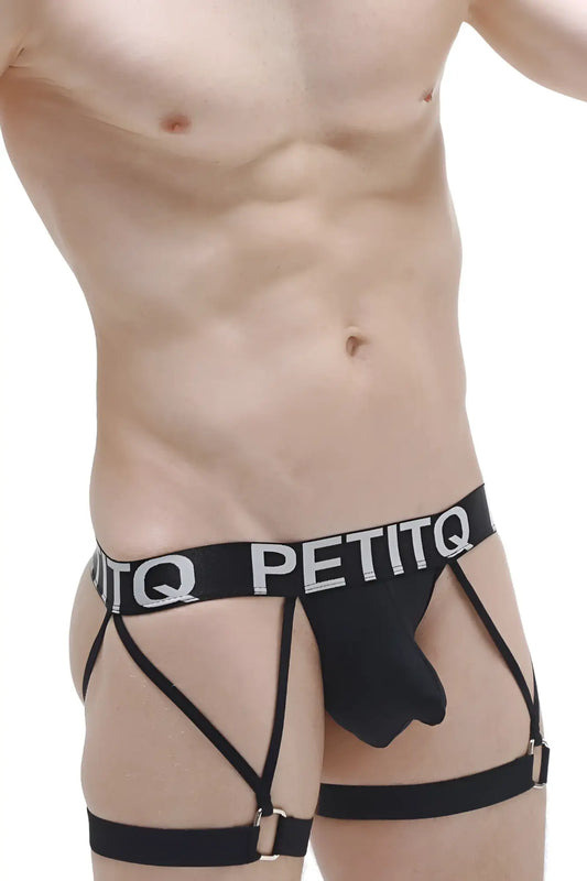 Black petitq men’s g-string garter carys briefs with supportive strappy design and white lettering on waistband