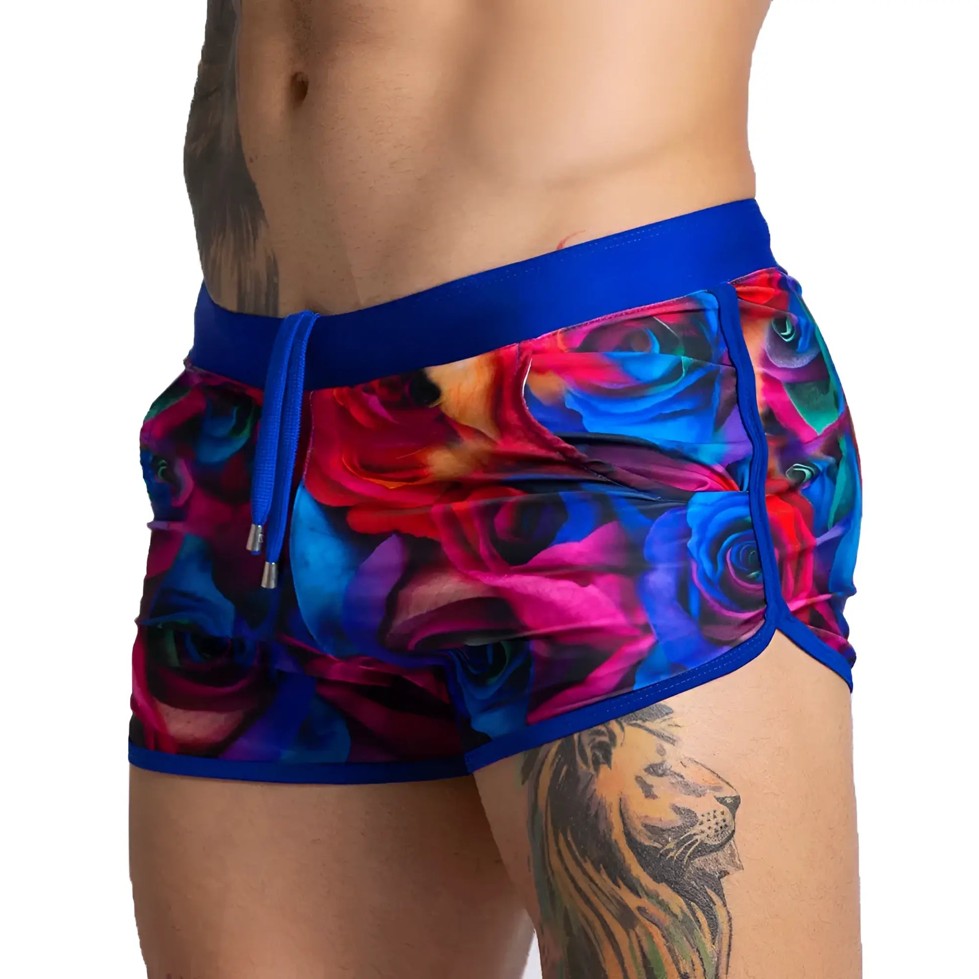 Gigo Carnations beachwear multicolored rose-patterned swim trunks with bold blue waistband and matching drawstring
