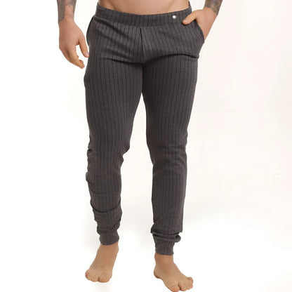 Dark gray pinstripe joggers with elastic cuffs and a subtle button at the waistband from gigo casual sportpants